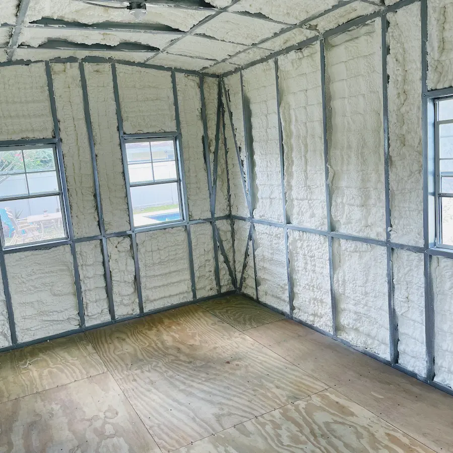 Closed-cell spray foam insulation applied to wall cavities in a residential project in Northglenn